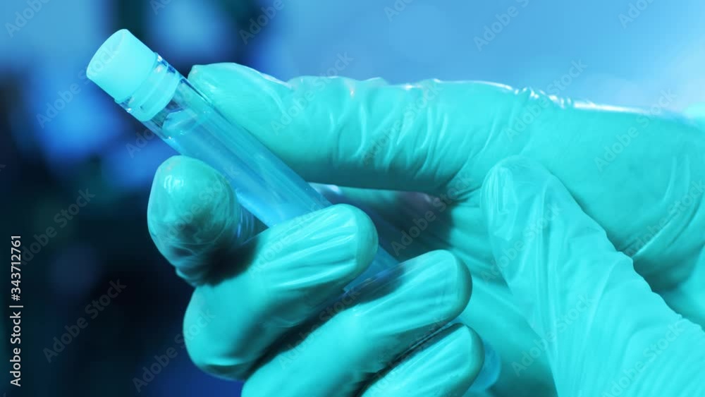 Laboratory tubes with blood and virus. Close-up of scientific lab in hospital. Epidemic disease, healthcare, vaccine research and coronavirus 2019-ncov test.
