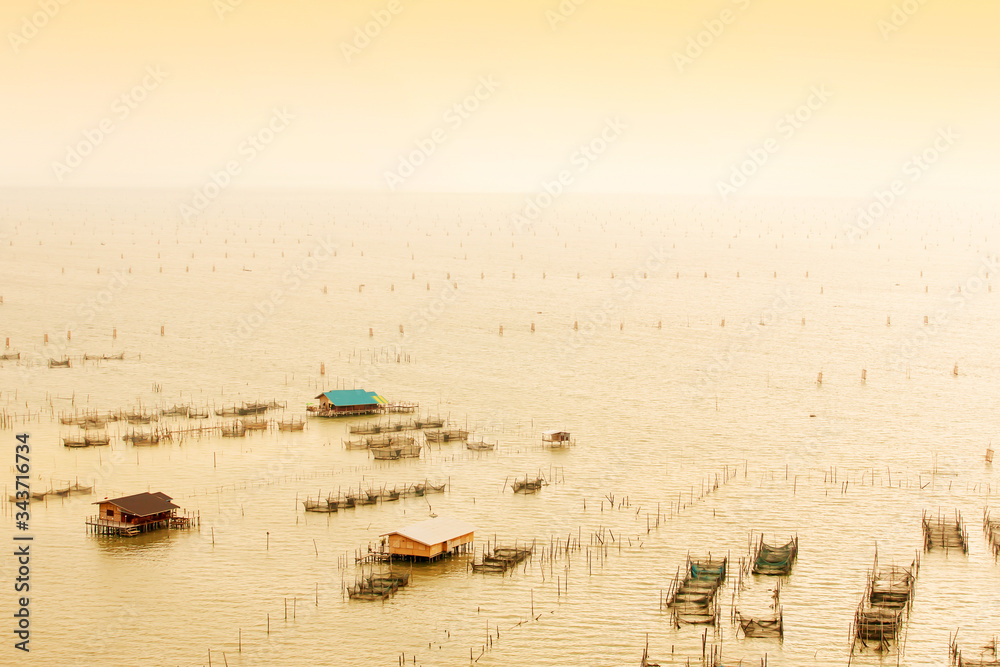 Houseboat community on the Songkhla Lake. Houseboat community on the Songkhla Lake.