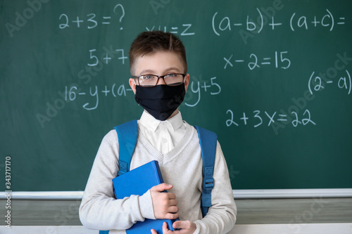 Little schoolboy wearing pr...