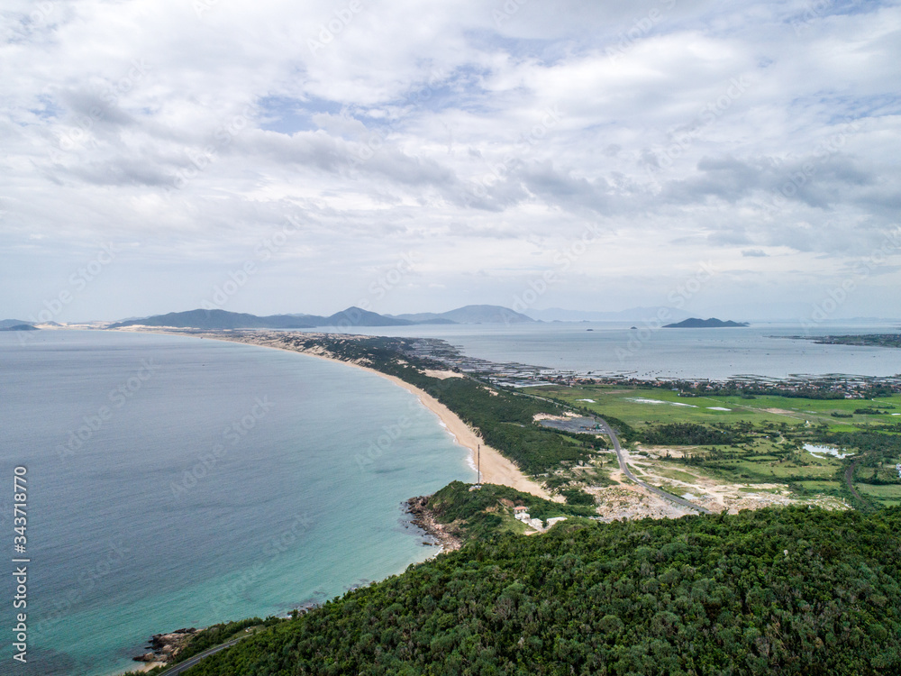 Aerial view of Dai Lanh beach, Van Ninh, Khanh Hoa. Situated at the south central coast of Vietnam,a two-kilometre bay with a fishing village at one end & a beach at the other