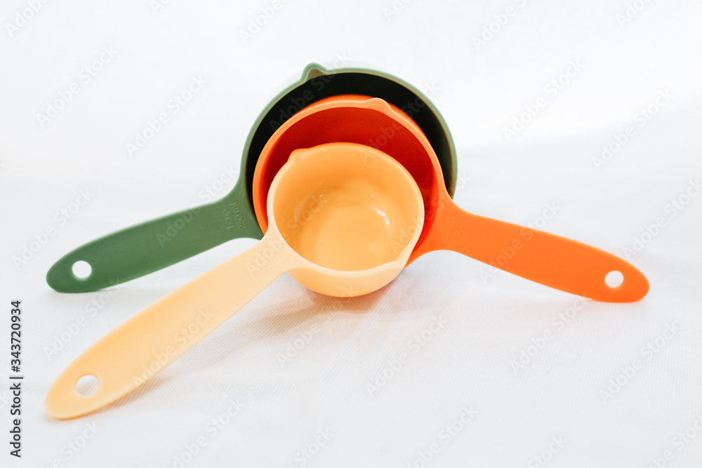 Set of measuring cups or measuring spoons use in cooking Set of measuring cups or measuring spoons use in cooking