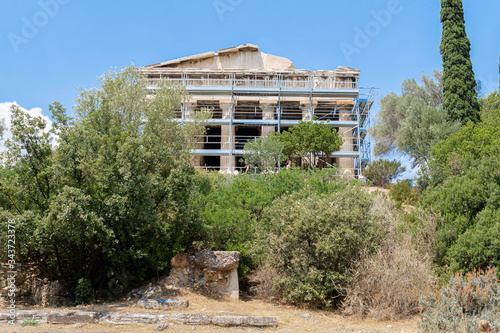 View of the main facade of the Temple of Hephaestus with scaffolding during the rehabilitation works in the Ancient Agora, Athens, Greece photo