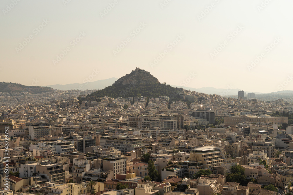 Views of the layer of pollution emboldening Mount Lycabettus and the city of Athens, Greece.