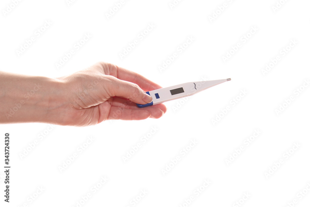 Hand holds a thermometer Hand holds a thermometer