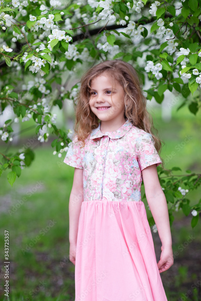 portrait of a little girl in the park portrait of a little girl in the park