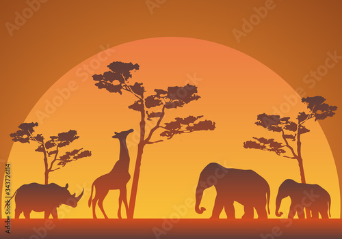 Silueta de un atardecer en la savana con elefantes  jirafas y rinocerontes.