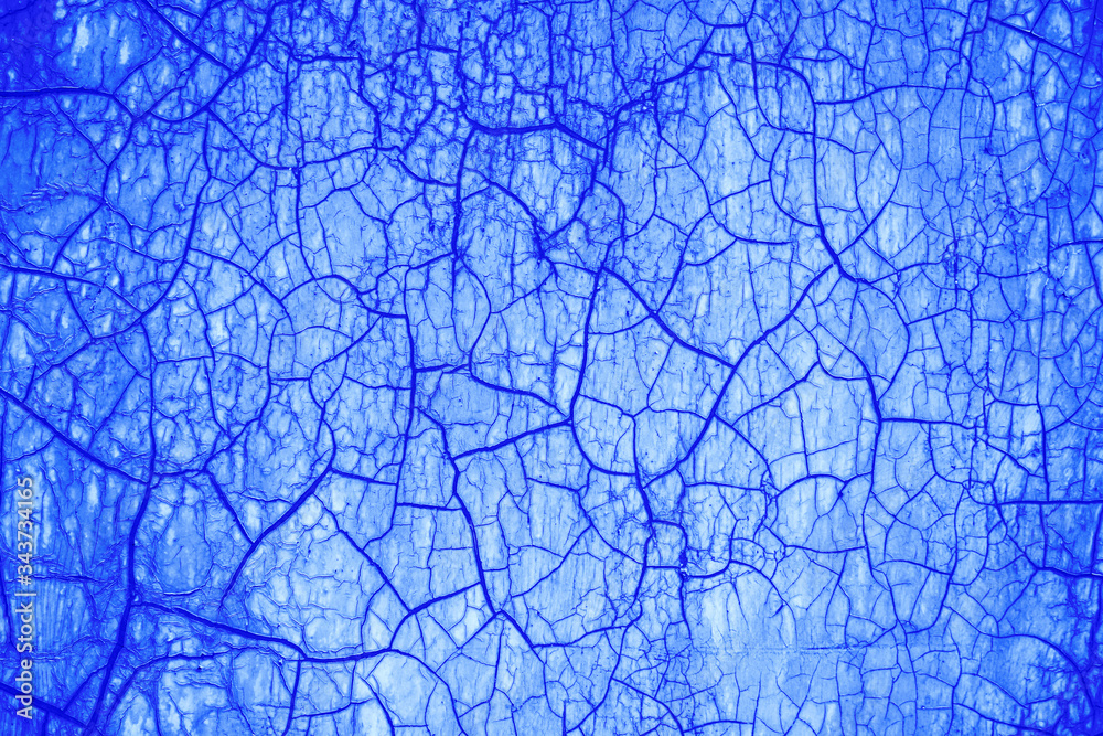 Obraz premium Cracked surface, abstract blue background