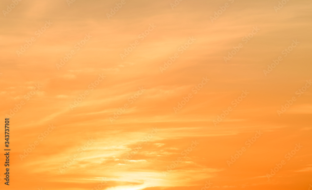 Sky of hope and new life,dramatic orange clouds sky background