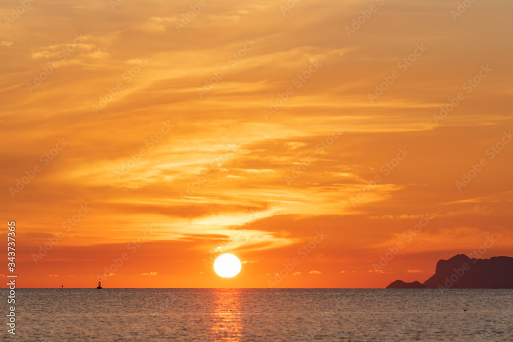 Beautiful tropical beach Omega sunset with golden lights background,Koh Samui Thailand