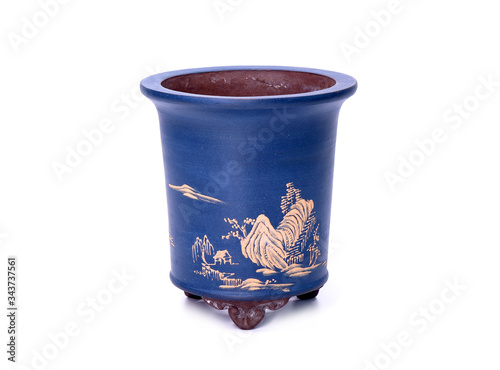 Antique Chinese bonsai pot isolated on white background. Handmade purple sand (Zi-Sha) clay bonsai pot photo