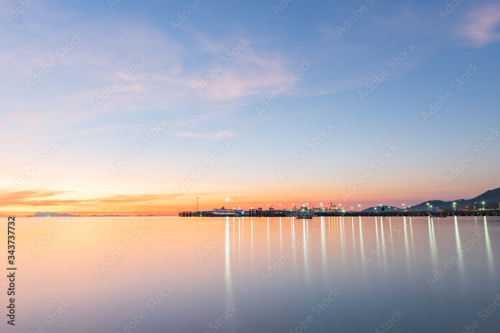 Panoramic tropical  blue sea sky sunset with golden light  at Samui island pier background ,long exposure