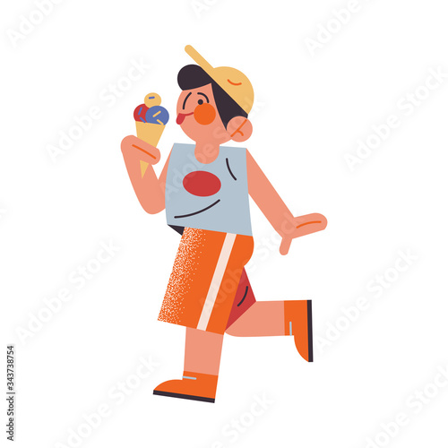 The funny young boy in orange shorts eating ice cream. Vector illustration in the flat cartoon style. © greenpicstudio