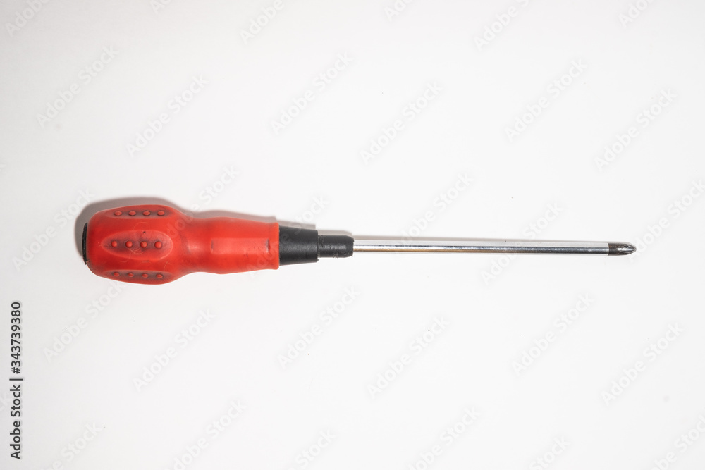 Old figure screwdrivers on white background Old figure screwdrivers on white background