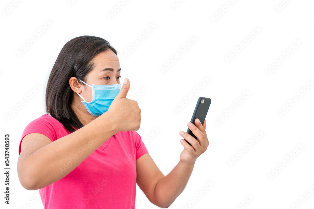 Corona virus (COVID-19), During detention at home Masked women use phones to make video calls to friends