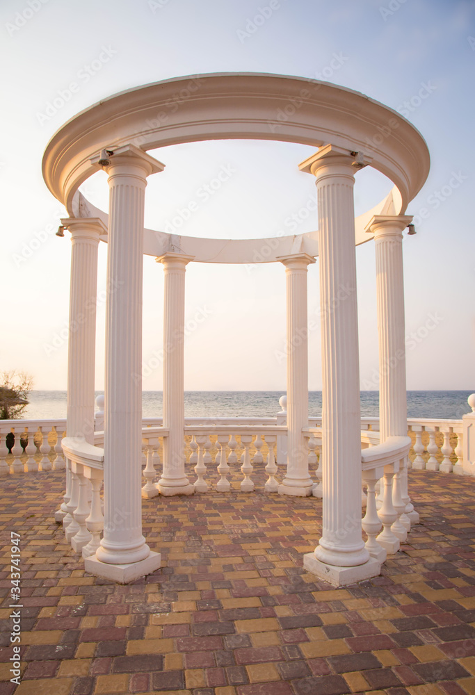 Rotunda, small architectural forms made of natural material, column, Palace style. Arch for weddings and exit ceremonies. 