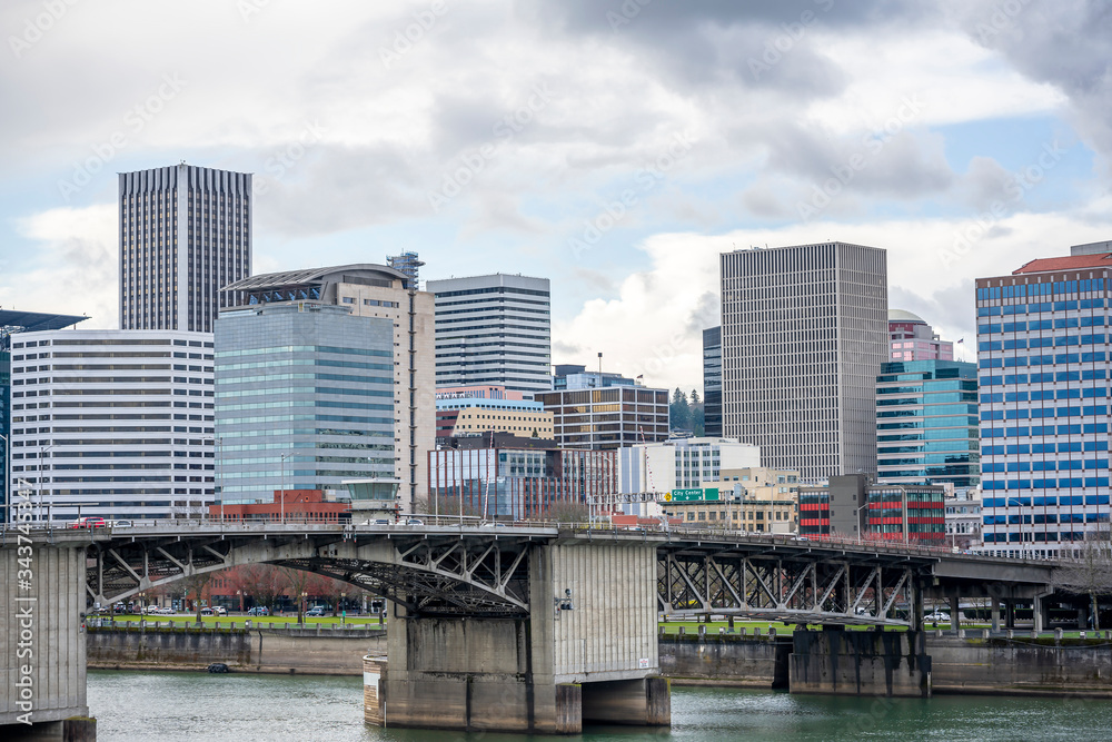 Morrison Bridge over Willamette River overlooking a business building district in down town Portland Morrison Bridge over Willamette River overlooking a business building district in down town Portland