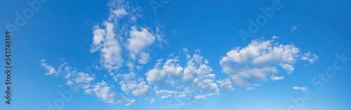 Beautiful blue sky panorama with white clouds. Banner.