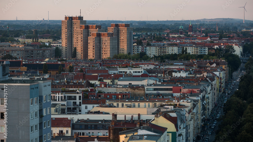 View of the famous Plattenbau buildings during sunset  in Prenzlauer Berg, Berlin, Germany 