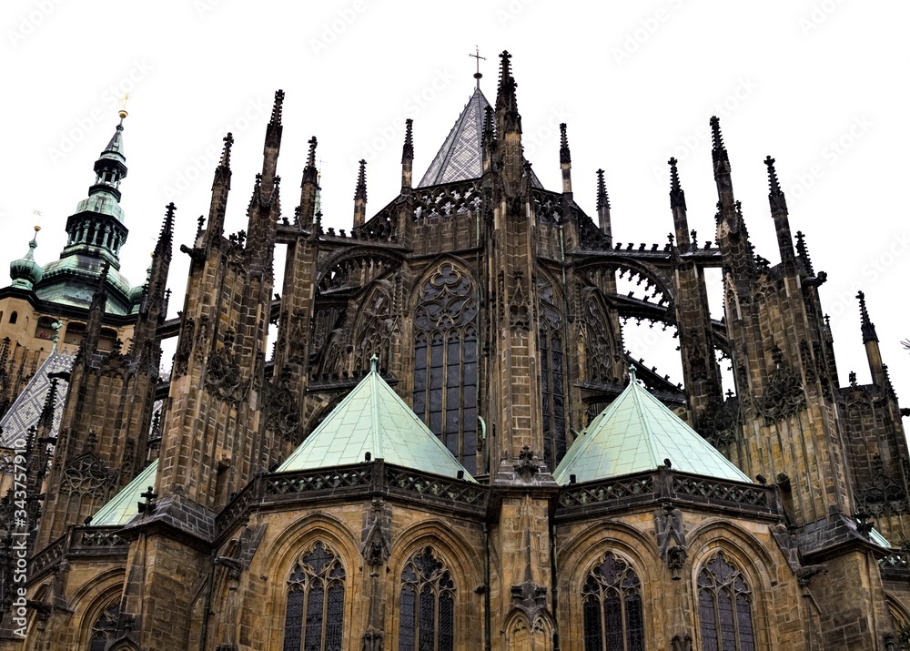 Prague, Czech Republic - 28 December 2019: Exterior details of St. Vitus Cathedral, a gothic religious building with towers, spires and mosaic decorations