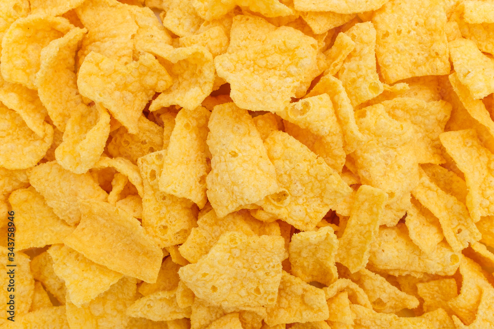 Chips made of corn on a white background Chips made of corn on a white background