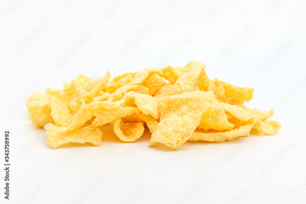 Chips made of corn on a white background Chips made of corn on a white background