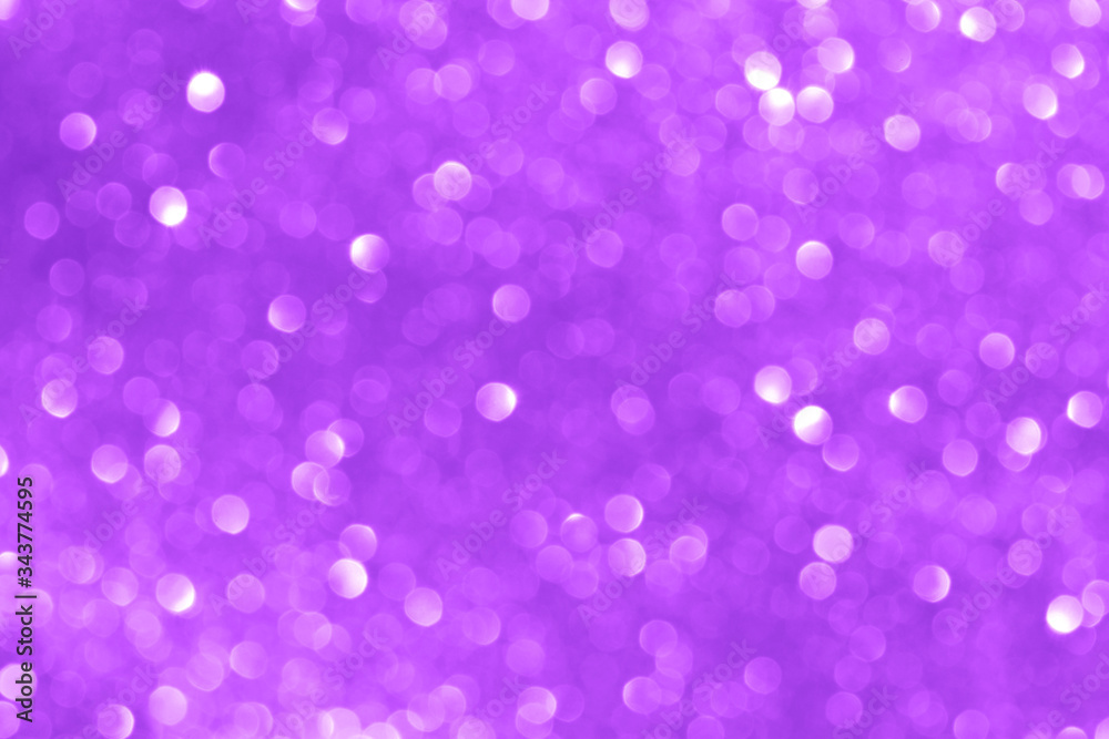 Purple light glitter bokeh texture background.  Concept for New Year, Christmas, and All Celebrations.