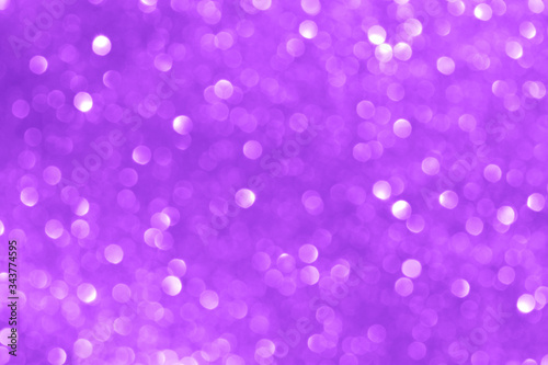 Purple light glitter bokeh texture background. Concept for New Year, Christmas, and All Celebrations.