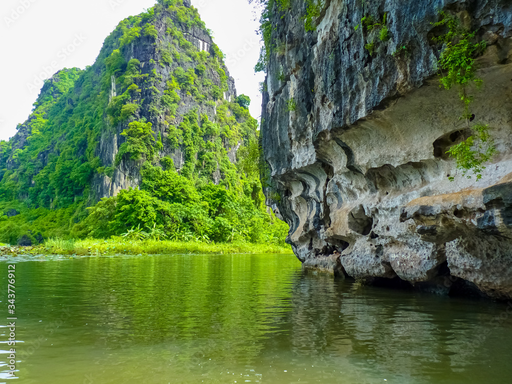 Quiet Ride On Peaceful Tam Coc River, Ninh Binh, Vietnam Quiet Ride On Peaceful Tam Coc River, Ninh Binh, Vietnam