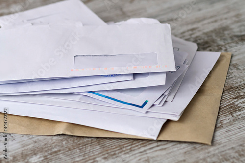 A stack of professional or invoice letters