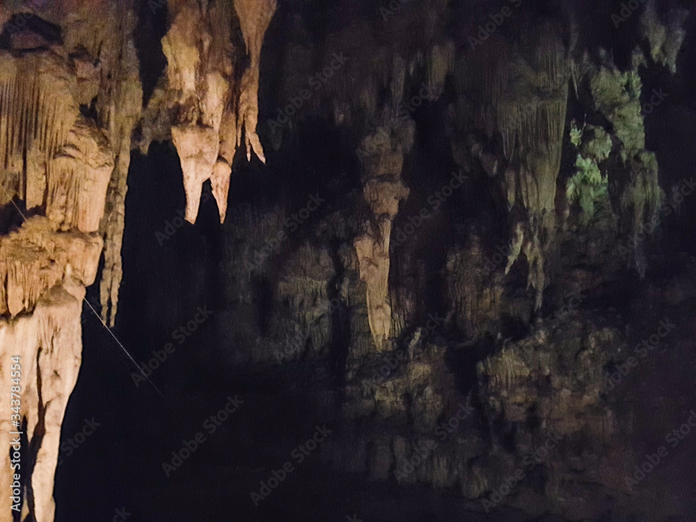 Limestone chalk stone cave inside water river brown light dark black green background cave pai tour chiang mai thailand