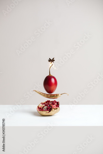 Pomegranate with chili on table