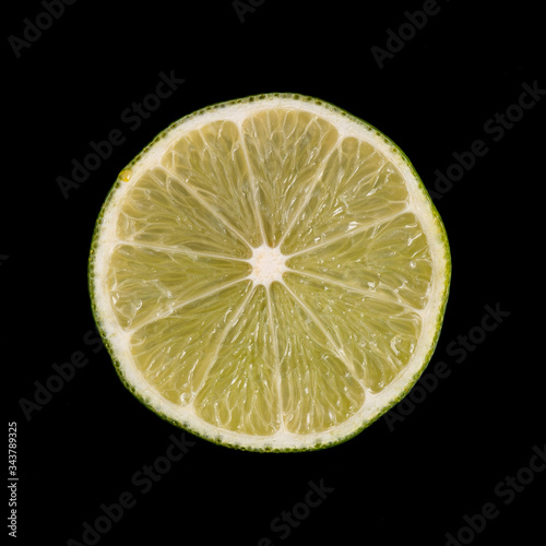 lime slice on a black background