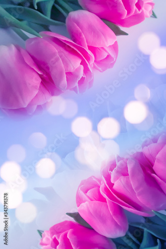 Delicate spring, floral background with tulips and bokeh.