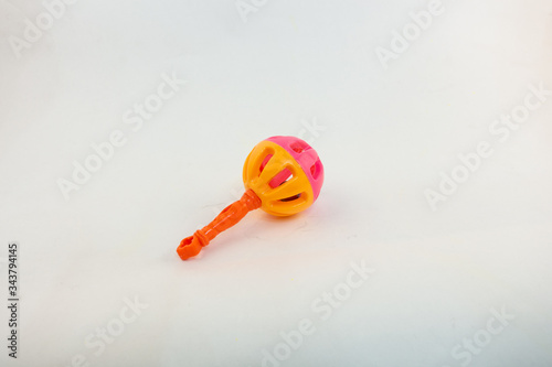 children's bright colorful toys on a white background