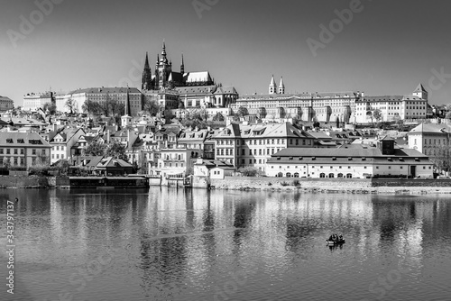 Scenic view of Prague Castle, Czech: Prazsky Hrad, from Vltava River embankment on sunny spring day, Praha, Czech Republic