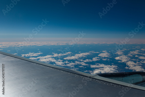 Obraz na płótnie View from airplane on blue sky w salonie