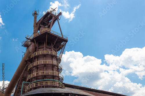 Sloss Furnaces National Historic Landmark, Birmingham Alabama USA, monumental view of industrial steel mill structure wrapped with inclined walkways, horizontal aspect photo