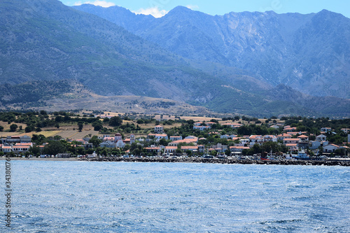 View of Kamariotissa town (Samothraki harbor) taken from ferry