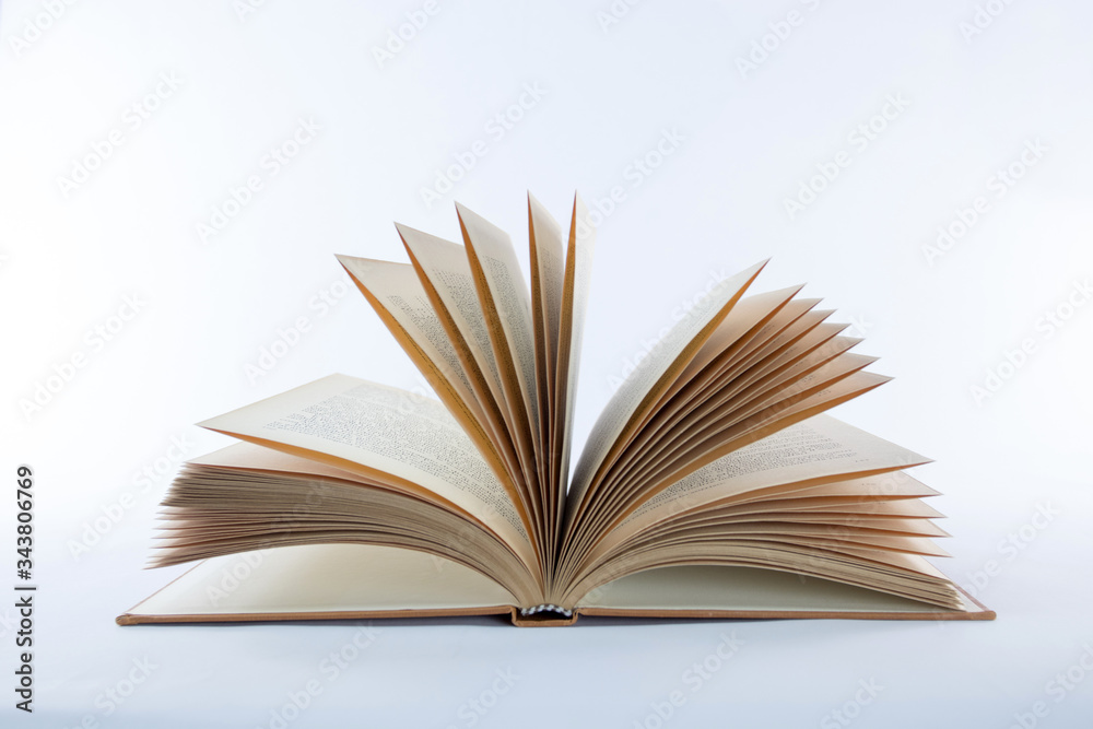 open old book on a white background open old book on a white background