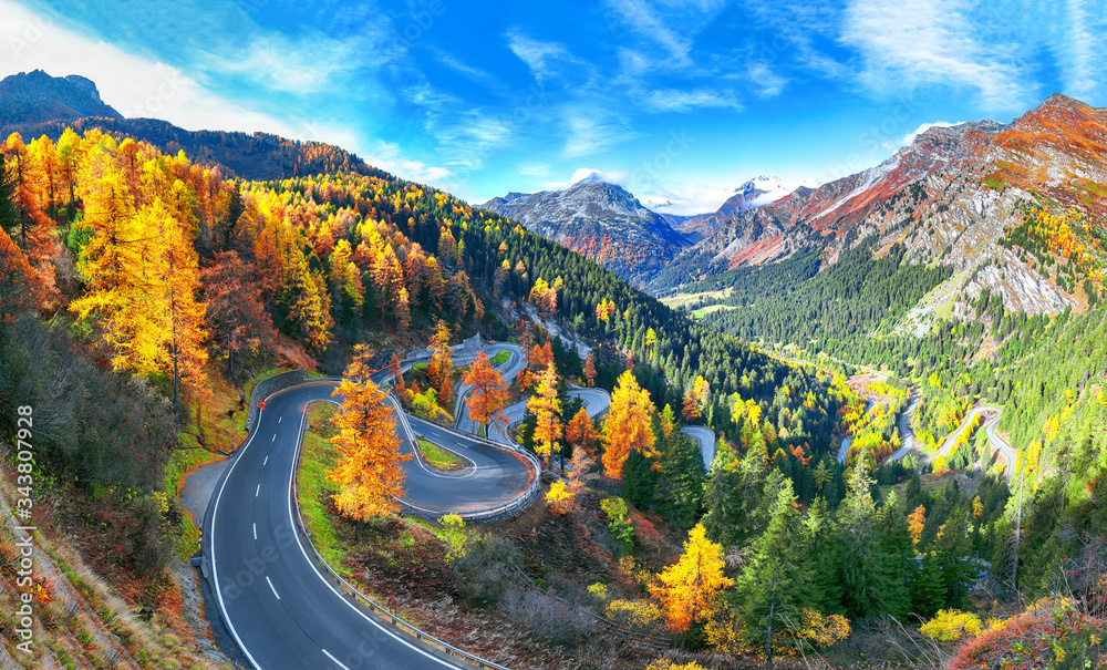 Stunning view of Maloja pass road at autumn time.