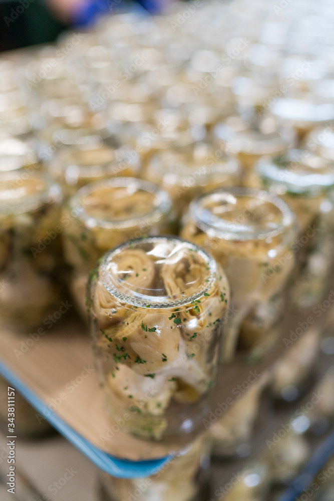 processing of artichokes in oilHandmade Apulian traditional products for preserves to eat all year round processing of artichokes in oilHandmade Apulian traditional products for preserves to eat all year round