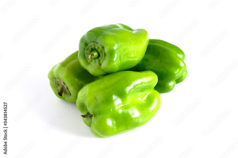Green peppers on a white background. Cooking Products Green peppers on a white background. Cooking Products