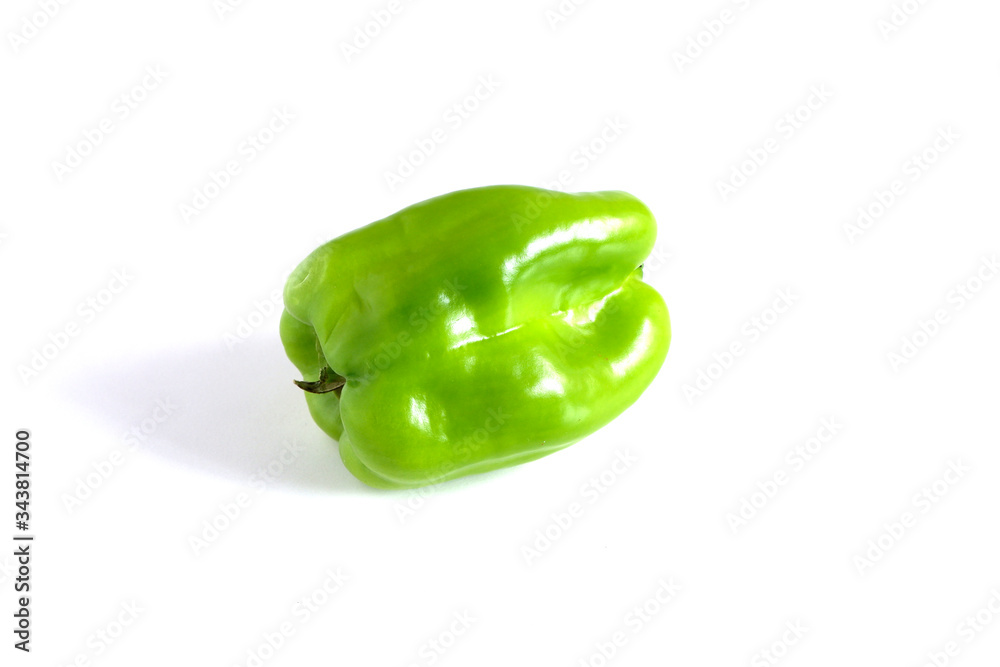 Green peppers on a white background. Cooking Products Green peppers on a white background. Cooking Products