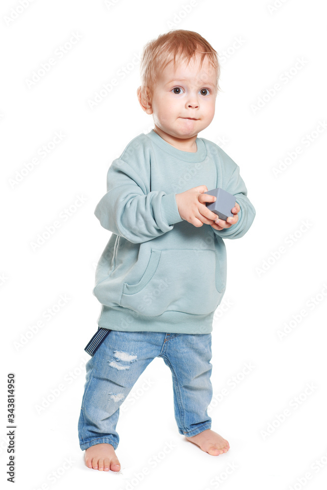 Fashionable portrait of a charming baby boy in a mint sweatshirt Fashionable portrait of a charming baby boy in a mint sweatshirt