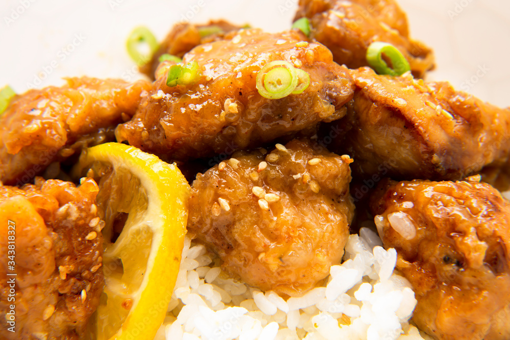 Sticky Chinese Lemon Chicken on the plate Sticky Chinese Lemon Chicken on the plate