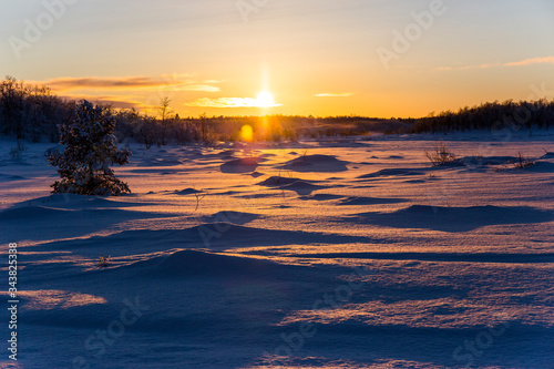 Winter sunset in Nuorgam, Lapland, Finland photo