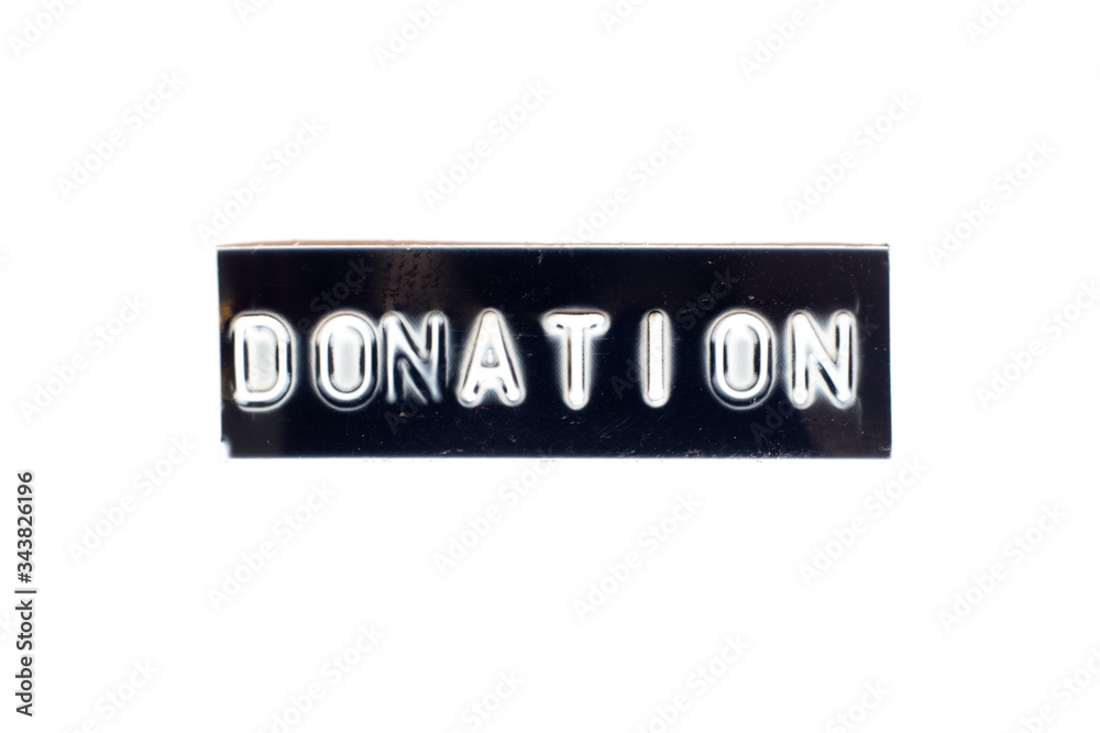 Embossed letter in word donation in black banner on white background Embossed letter in word donation in black banner on white background