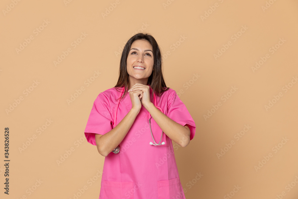 Young doctor with a pink uniform Young doctor with a pink uniform