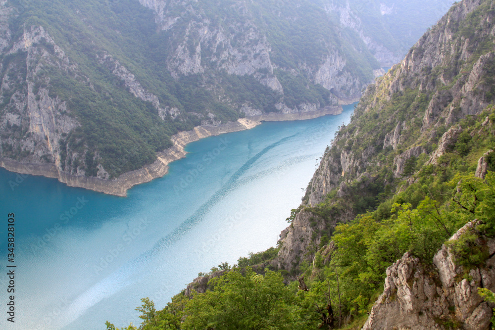 Piva Lake reservoir in the mountains in Montenegro Piva Lake reservoir in the mountains in Montenegro