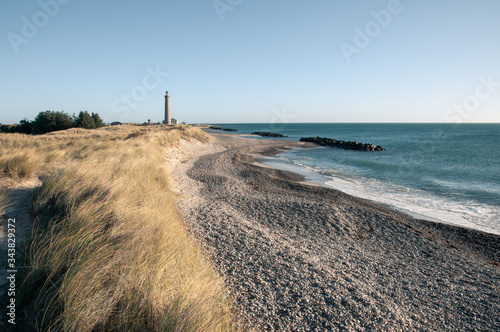 Lighthouse and dunes, blue sky, Skagen, Denmark, Scandinavia